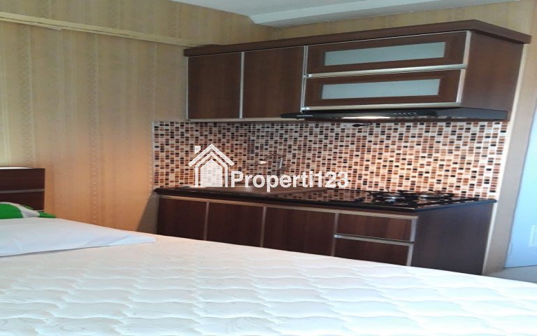 Apartemen the green pramuka city sewa 12 bulan studio - 1