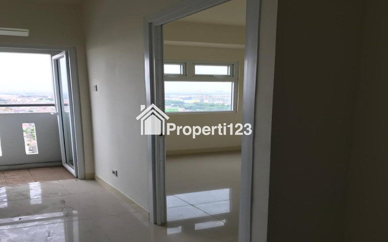 Apartemen the green pramuka city 2 kamar kosong mall tower - 1