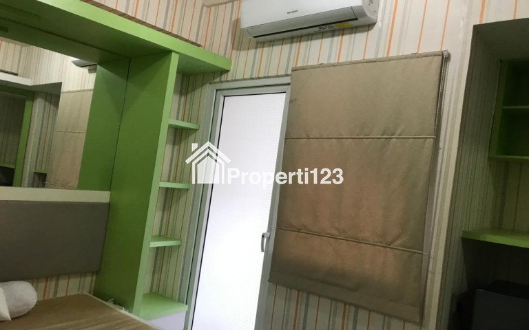 The green pramuka city studio furnish per tahun - 1