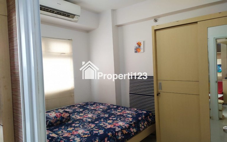 Apartemen the green pramuka city 2 kamar furnish - 1