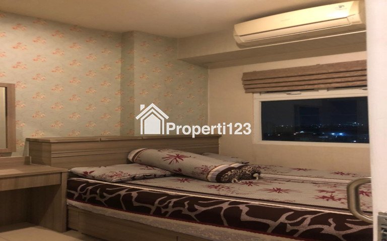 Apartemen the green pramuka city 2 kamar furnish tower mall Magnolia - 1