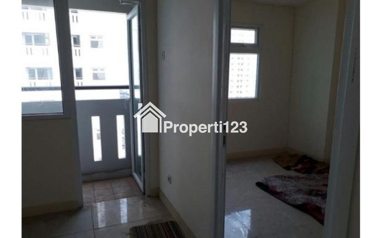 Apartemen the green pramuka city 2 kamar kosong. - 1