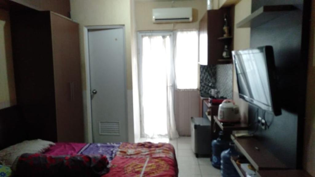 Apartemen the green pramuka city studio furnish bu - 2