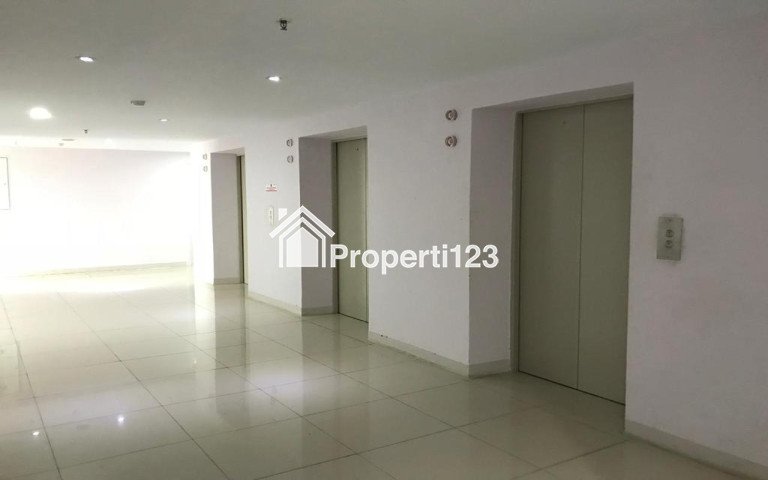Apartment the green pramuka city 2 kamar kosong - 1