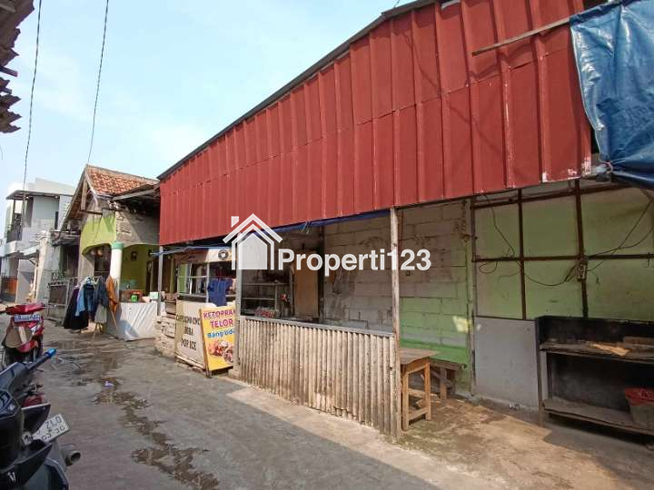 Rumah berikut 3 kios strategis pinggir jalan Raya Pramuka Depkk - 5