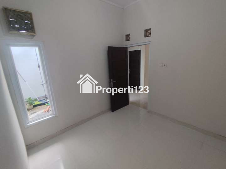 Rumah second murah siap huni full renovasi dlm perumahan row jalan luas diRangkapan jaya,depok - 3