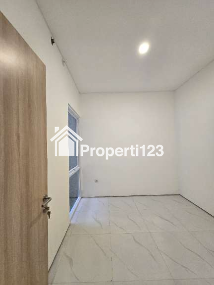 Rumah modern dalam komplek di Pondok Kelapa Jaktim - 2