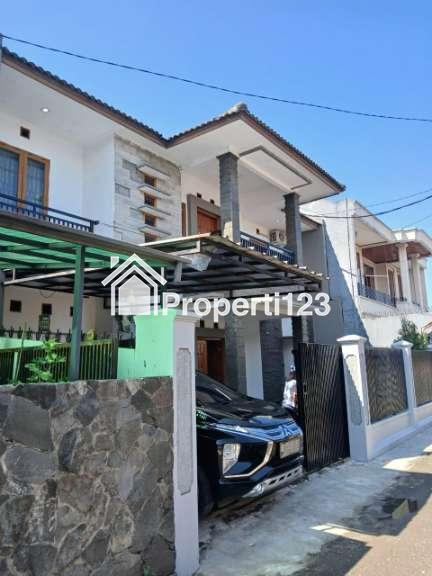 Dijual Rumah Terawat 2 Lantai di Jl Bahagia Margacinta dekat Tol Buah Batu,5 Kamar - 11