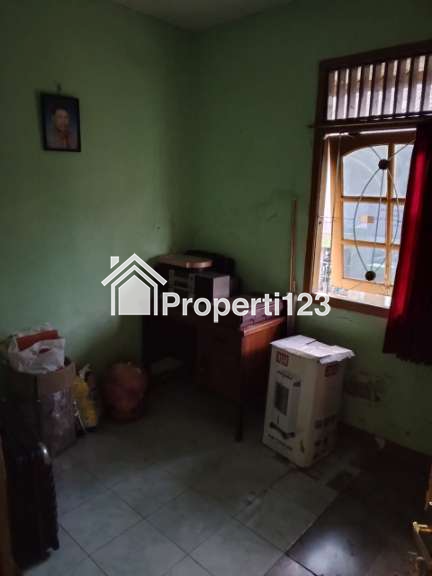 Dijual rumah 1 (satu) lantai di Kota Bekasi, 100 m2, Rp. 650 Juta (Nego), Bebas Banjir, Cocok untuk investasi, Bisa direnovasi ulang dijadikan Kontrakan Beberapa Pintu, Passive Income - 11