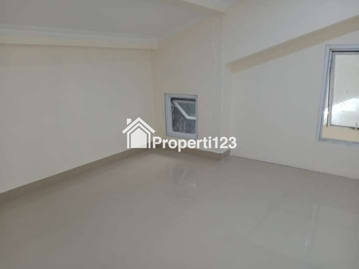 Rumah mezzanine 1,5 lantai di Perumnas Depok 1 Pancoran Mas Depok - 10