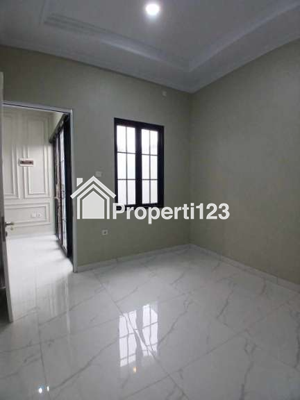 Rumah modern 3 lantai dengan rooftop di Ciganjur Jakarta Selatan - 10