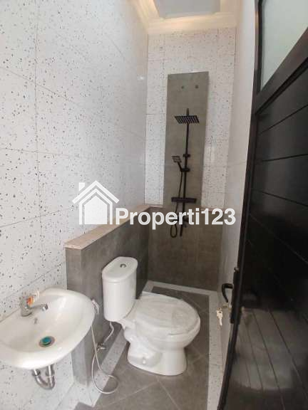 Rumah Modern Klasik 2 lantai di Kalimulya Depok - 9