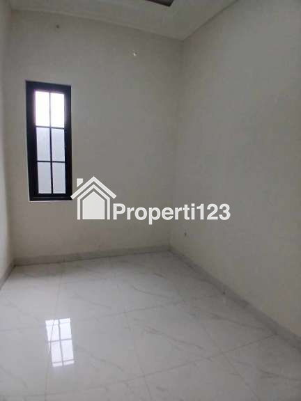 Rumah Modern Klasik 2 lantai di Kalimulya Depok - 10