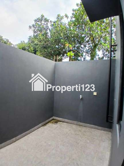 Rumah Modern Klasik 2 lantai di Kalimulya Depok - 12