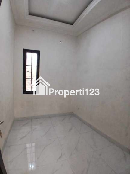 Rumah Modern Klasik 2 lantai di Kalimulya Depok - 6