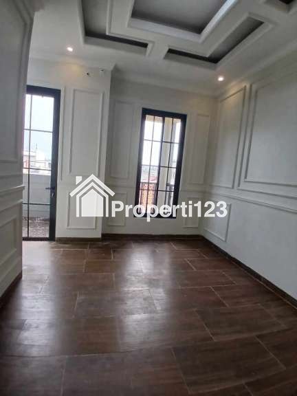 Rumah murah 2 lantai siap huni American classic dikalimulya,Depok - 10