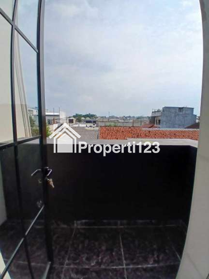 Rumah murah 2 lantai siap huni American classic dikalimulya,Depok - 15