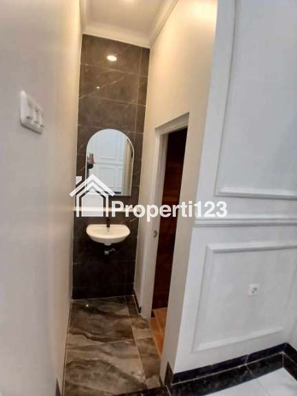 Rumah murah 2 lantai siap huni American classic dikalimulya,Depok - 4