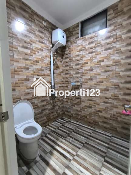 Rumah 5 Kamar Tidur Cluster Arana Kota Harapan Indah Bekasi - 16