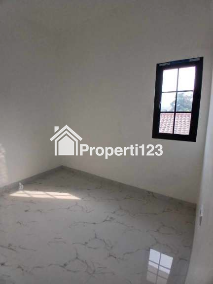 Rumah 2 lantai Klasik Modern di Kav UI Barat Tanah Baru Depok - 11