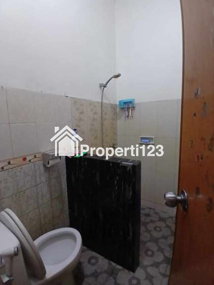 Rumah second terawat dalam perumahan Kav UI Barat Tanah Baru Depok - 9