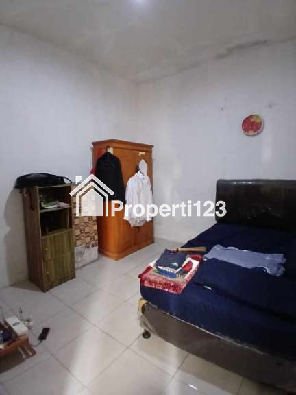 Rumah second terawat dalam perumahan Kav UI Barat Tanah Baru Depok - 15