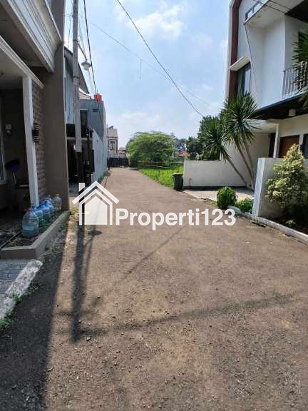 Rumah 2 lantai ada rooftop dalam cluster di Rangkapan Jaya Baru Depok - 2
