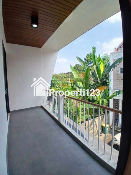 Rumah 2 lantai ada rooftop dalam cluster di Rangkapan Jaya Baru Depok - 11