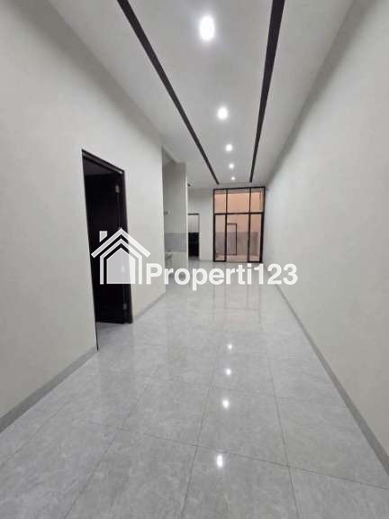 Rumah Baru Modern Tropical di Babatan Pantai Mulyorejo Surabaya - 2
