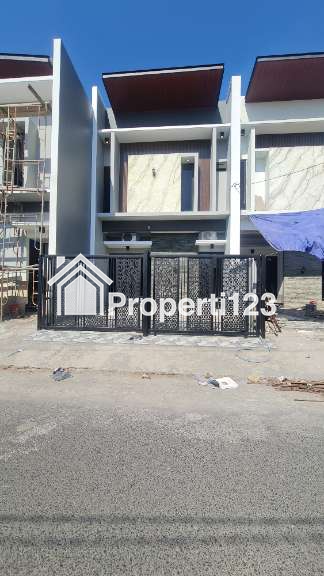 Rumah Baru Modern Lokasi Manyar SUkolilo Surabaya - 4