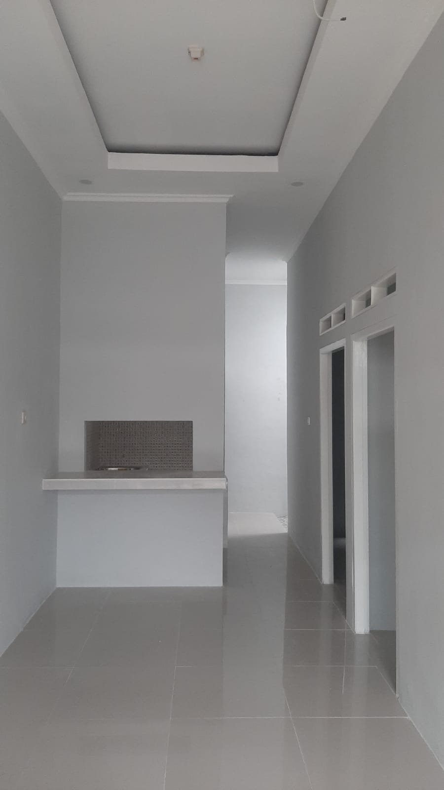 Rumah biru laut pintu samping bekasi - 1